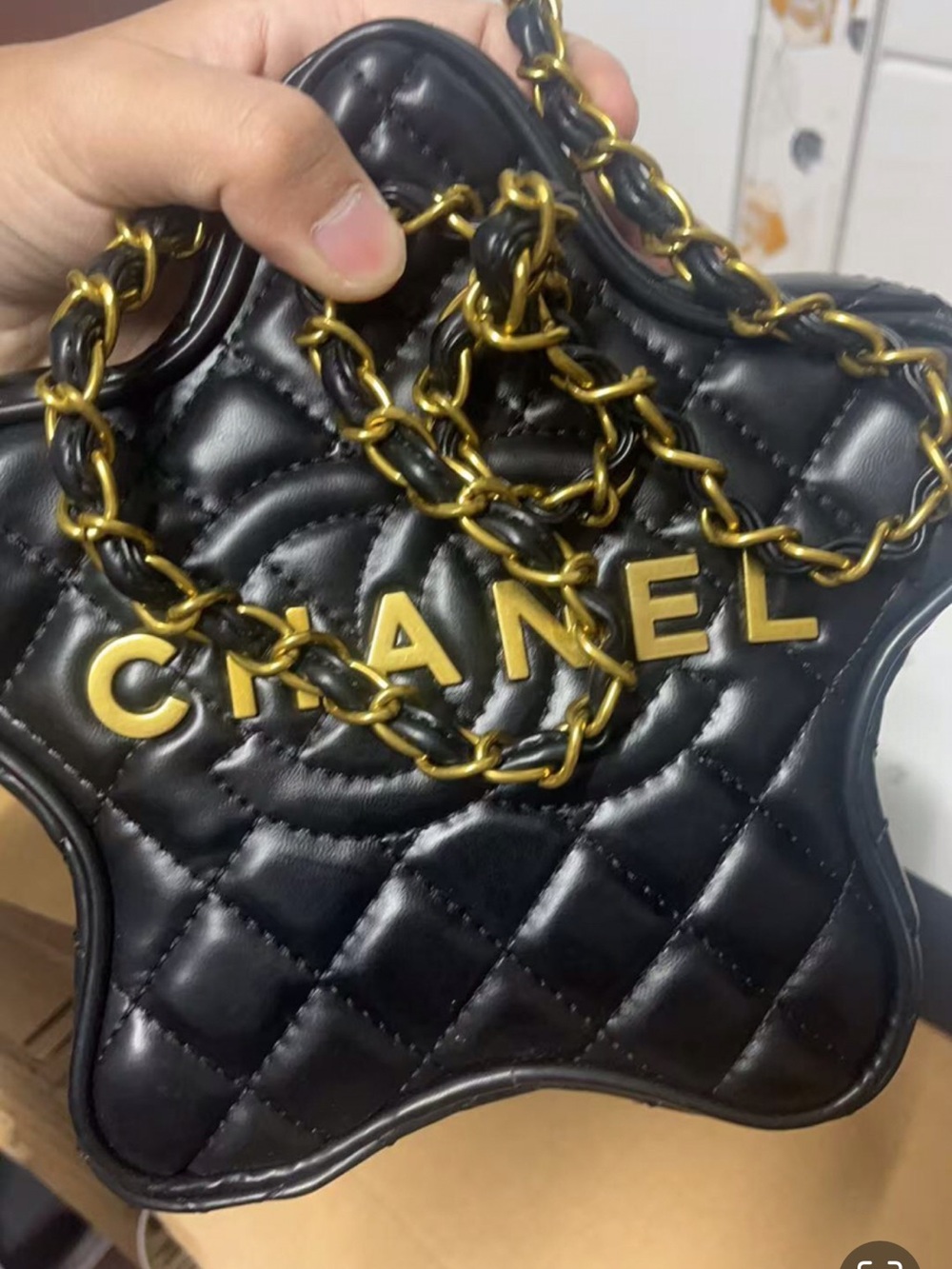 CHANEL Black VIP GWP Quilted Star Mini Bag with Gold Hardware.